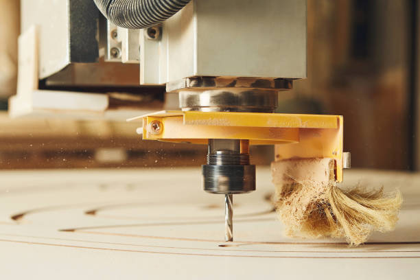 istock CNC router machine creates a layout of the shelf complex. 1864552442