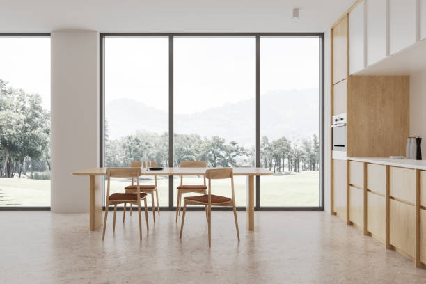 istock Dining table in white and wooden kitchen 1864554026