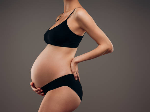 istock Beautiful pregnant woman 1864575646