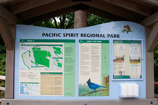 Vancouver, Canada - September 3,2021: View of Pacific Spirit Regional Park signboard with descriptions of trails and maps