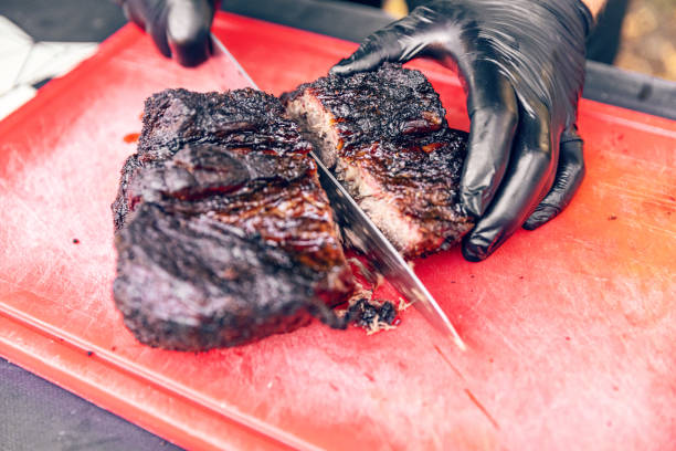 istock Cutting delicious roast beef meat 1864600829