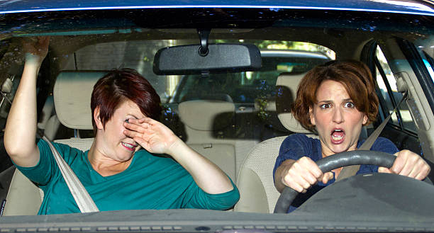 istock Car Crash Accident with a Scared Driver and a Passenger 186461424