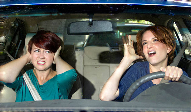 istock Driver Singing in the Car and Annoying a Passenger 186461426