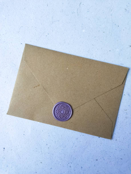 istock Envelope with wax seal on a white background, top view 1864648230