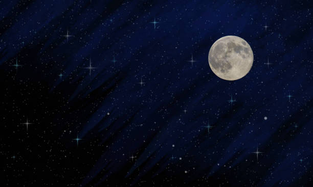 Moon rising over the field, winter night.