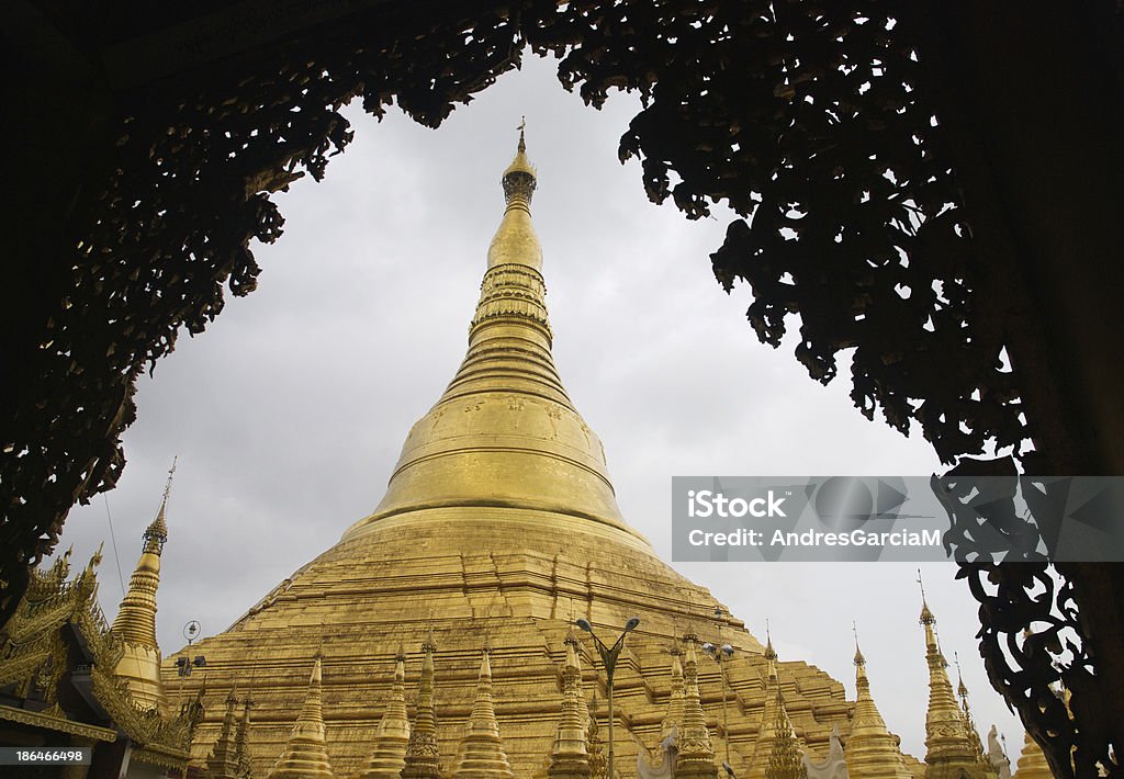 Shwedagon Pagoda, Yangon The Schwedagon Pagoda (Shwedagon Zedi Daw), a 99 metre gilded pagoda and stupa located in Yangon, Burma. Architectural Feature Stock Photo