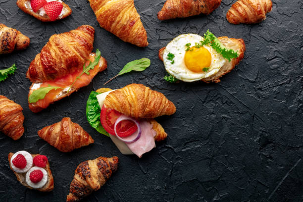 istock Croissant sandwich assortment. Various stuffed croissants, overhead 1864683142