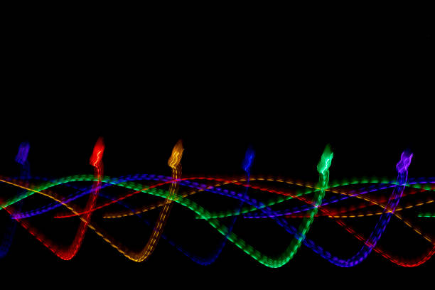 Free Stock Photo of Abstract colorful light trails on black background ...