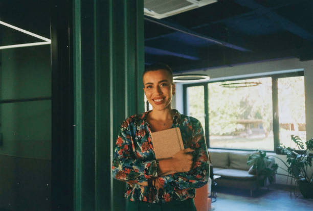 istock Analog Portrait of a beautiful IT programmer working in the modern company 1864717504