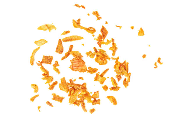 istock Crispy Roasted Onions isolated on white background. Dried fried onions Top view. Flat lay 1864729656
