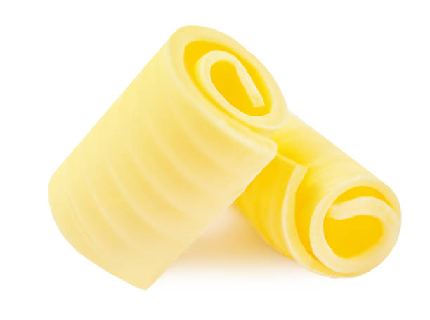 istock Butter curl or butter roll isolated on white background closeup. Food design elements 1864733854