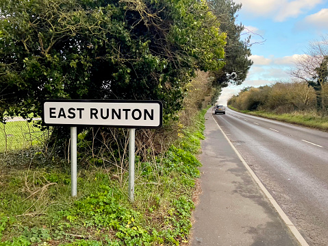 East Runton sign, on a rural road in north Norfolk. December 2023