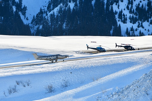 Private jet is landing on Courchevel airport by winter