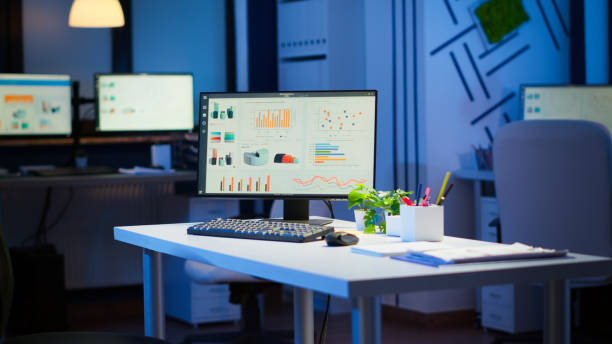 istock Empty start up business office with modern design during night 1864829939