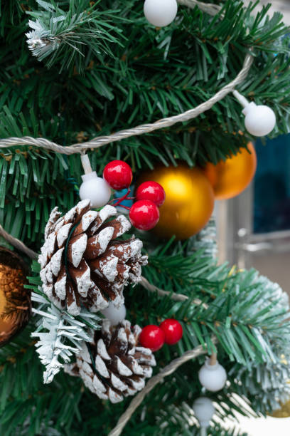 istock part of Christmas tree with decorations close up at vertical composition 1864851478