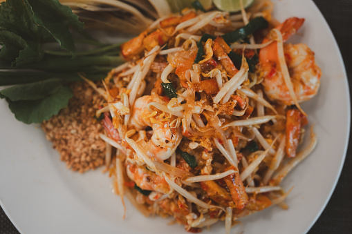Pad Thai stir fried, Asian noodles with shrimp, egg, tofu and bean sprouts