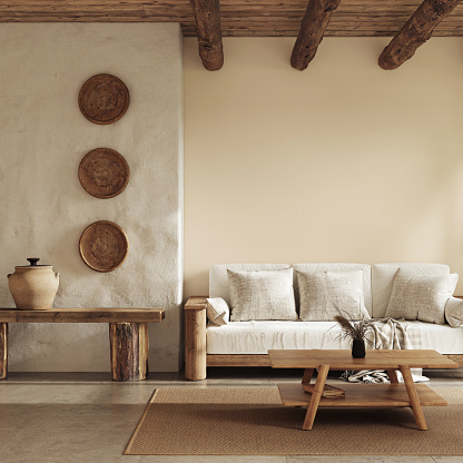 Warm wabi sabi style interior with beige walls and ethnic home furniture. Wall mockup