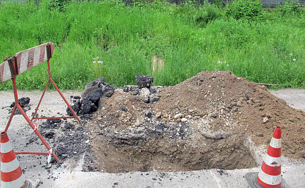 istock road excavation for the laying of electrical cable 186490795