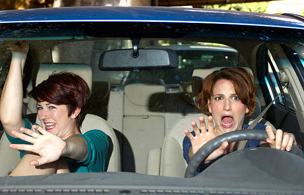 istock Two women in a car reacting to a crash 186491322