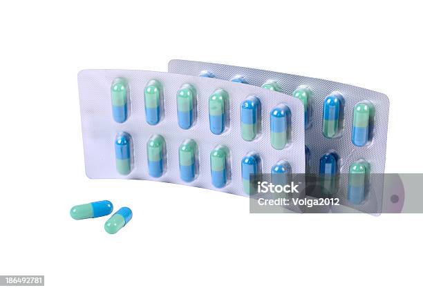 Due Capsule E Pillole Contenitore - Fotografie stock e altre immagini di Affari - Affari, Antibiotico, Blu