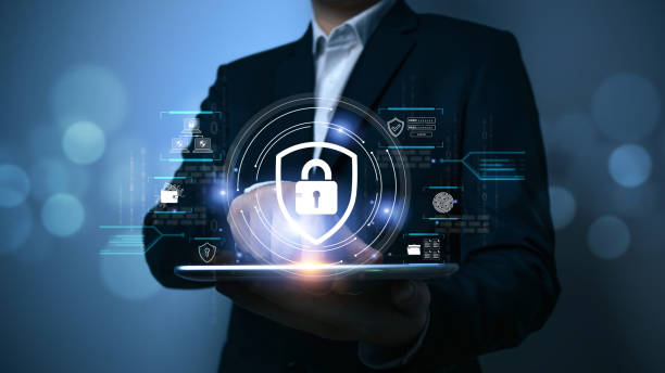 istock Businessman use secure tablet encryption technology, protect business and financial transaction data from cyber attacks, intelligent protection digital attacks. Cybersecurity and data protection. 1864933774