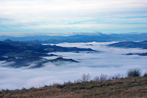 The hills and mountains of Montefeltro emerge from the sea of ​​fog at their feet