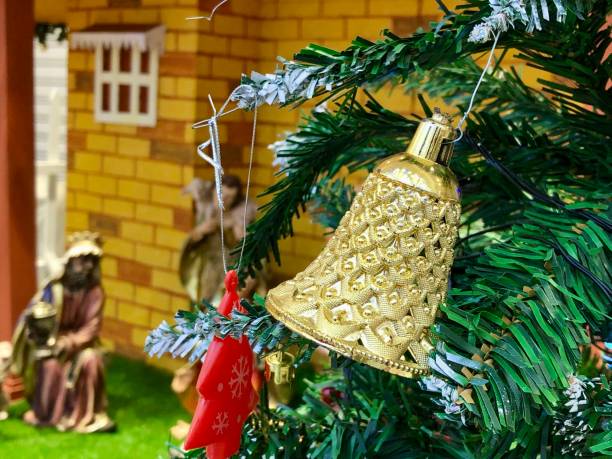 istock Ornaments on Christmas tree closeup. 1864938097