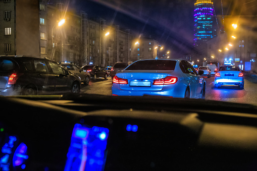 Night traffic on the avenue in the city center