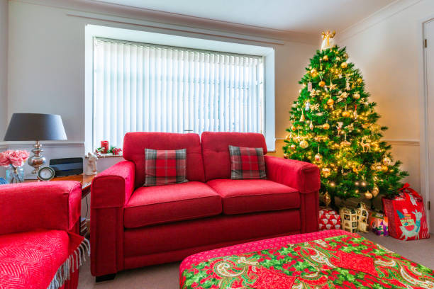 istock Living room decorated for the holidays with illuminated Christmas tree 1864954807