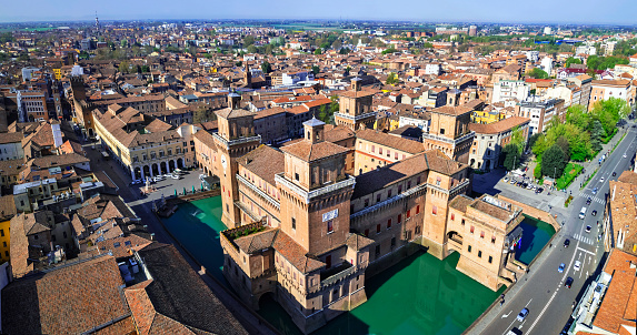 Ferrara - beautiful medieval town in Emilia Romagna Italy. aerial drone view of castle Estense in historic center