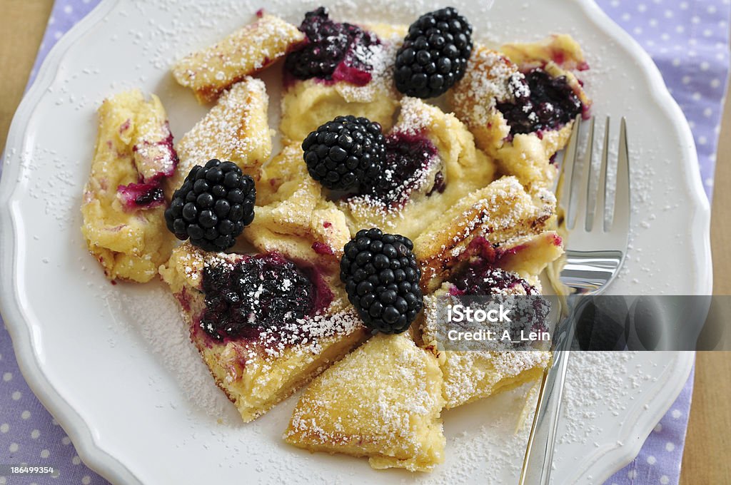 Kaiserschmarrn with blackberries - German pancakes Apple Sauce Stock Photo