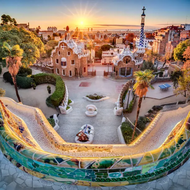 Sunrise at Park Guell of Barcelona captured during golden hour, designed by the famous architect Antoní Gaudí. UNESCO World Heritage since 1984.