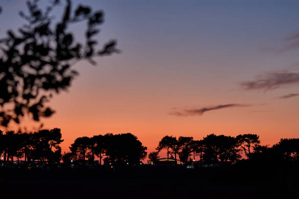 The silhouette of the Bayonne Campsite Walking in the summer along the Ramallosa promenade around 10 at night you can see incredible sunsets luz solar stock pictures, royalty-free photos & images