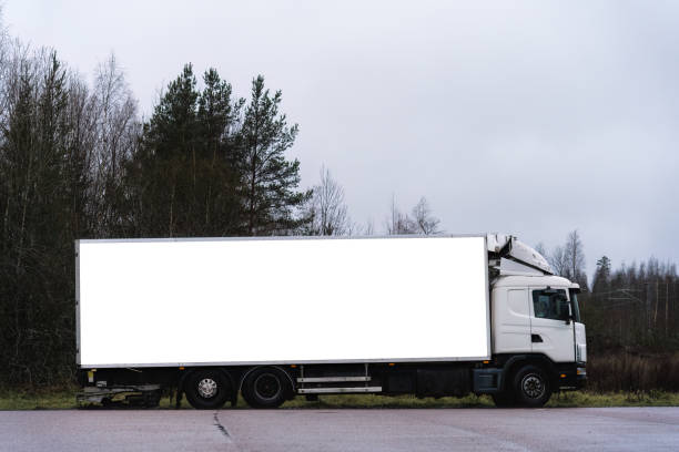 istock White lorry parked on a cloudy day. Mock up, clipping path. 1865038560