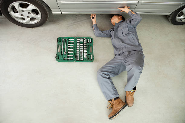 Man repairing car
