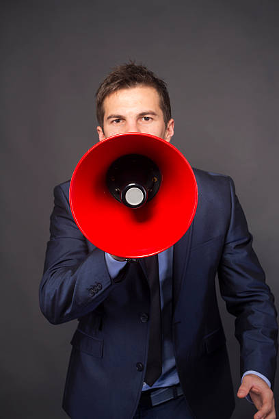 istock Businessman shouting in a megaphone 186505149