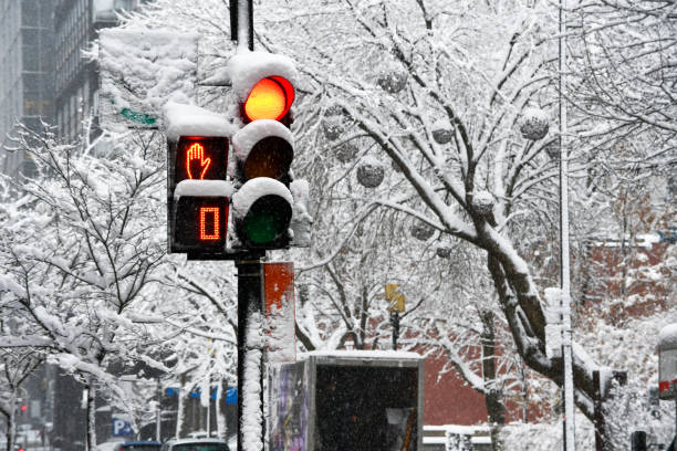 istock Traffic light turns red in downtown Montreal 1865055069