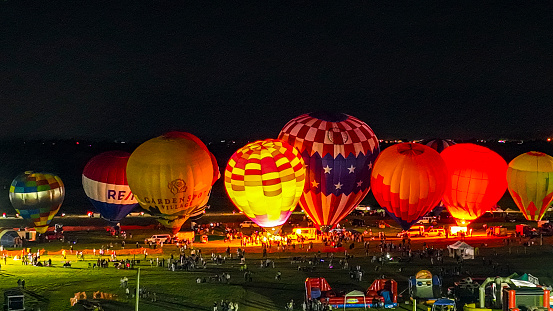 Hot air balloons landing in a Cappadocia Goreme Top Of Mountain Park Turkey.