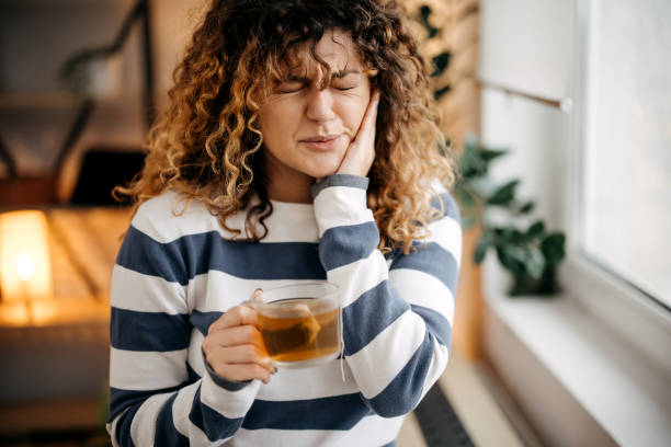 istock Sick female with toothache 1865082687