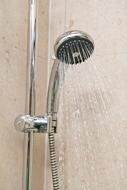 istock open water from shower in bathroom 186508444