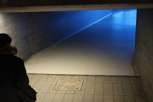 Wiesbaden, Germany - December 17, 2023: People walking in a Tunnel in front of Wiesbaden Train Station.