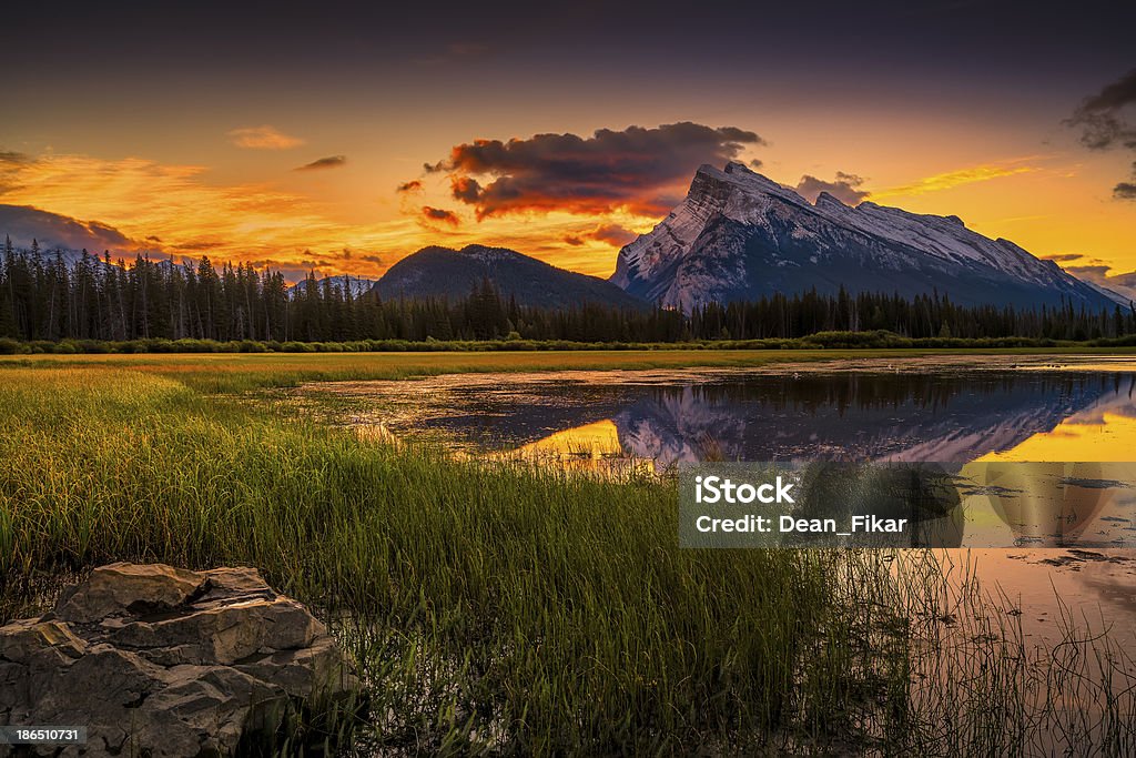 Vermillion Lakes Sunrise near Banff Golden early fall sunrise over the Canadian Rockies and Vermillion Lakes on the outskirts of Banff, Canada Alberta Stock Photo