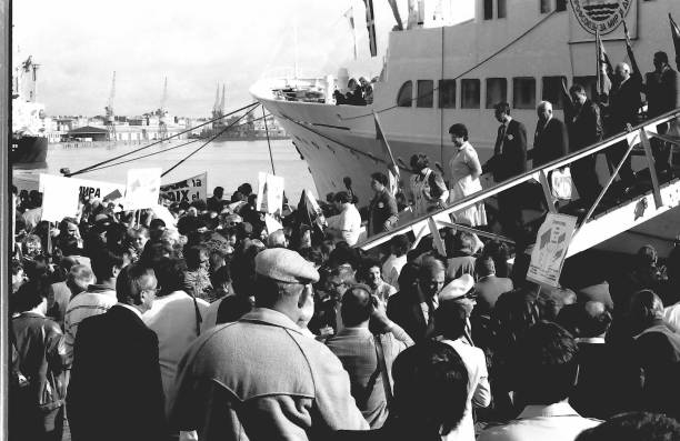 Visit in the 80s of a Soviet passenger ship with deserving workers of the Soviet Union. Members of the French Communist Party welcome the labourers