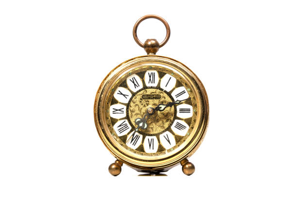 istock an old golden analog alarm clock with mechanical movement 1865174787
