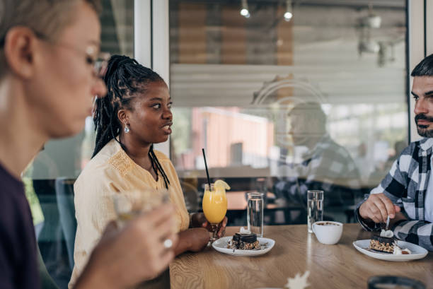 istock Friends enjoying in dessert 1865182036