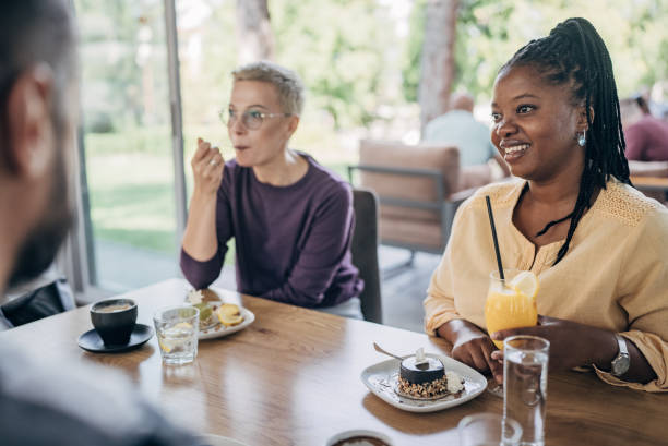 istock Friends enjoying in dessert 1865182571