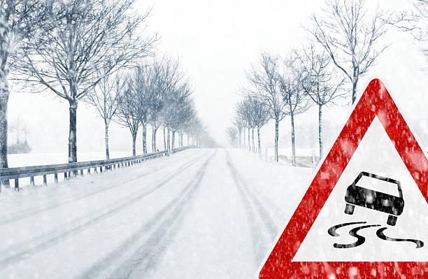 istock Snowy road with traffic sign 186518342