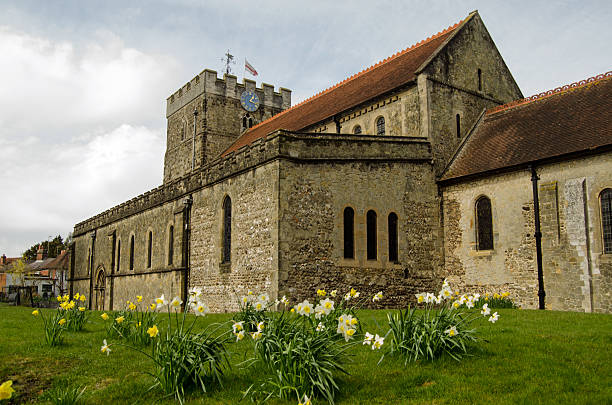 St Peter's Church in the Spring, Petersfield View of the parish church of St Peter in the middle of the market town of Petersfield.  Spring time and the daffodils are blooming. petersfield stock pictures, royalty-free photos & images