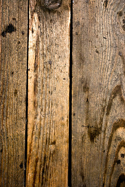istock Dark wooden grunge floor planks background or texture 186522937