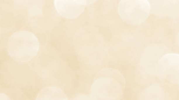 istock Golden yellow beige cream and white light glitter bokeh texture background. 1865248866